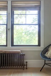 cast iron radiator under window in New Jersey Lakeside home