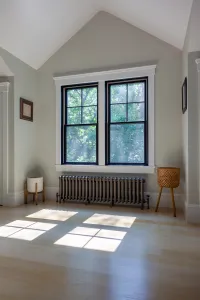 cast iron radiator under window in New Jersey Lakeside home