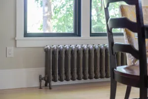 cast iron radiator under window in New Jersey Lakeside home