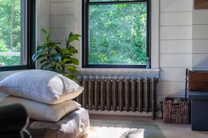cast iron radiator under window in New Jersey Lakeside home