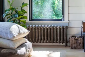 cast iron radiator under window in New Jersey Lakeside home