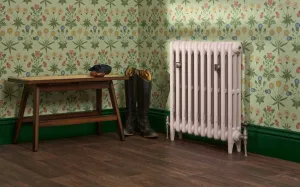 Cast iron radiator in Little Greene paint dorchester pink