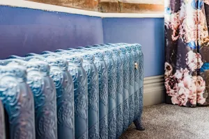ornate cast iron radiator in edwardian wedding venue