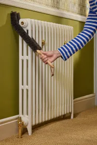 Redecker double stem radiator brush 510502 with Castrads Mercury cast iron radiator in Farrow & Ball Lime White