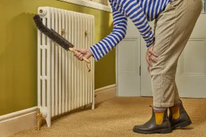 Redecker double stem radiator brush 510502 with Castrads Mercury cast iron radiator in Farrow & Ball Lime White