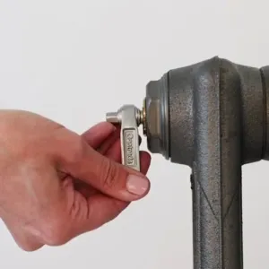 Castrads radiator key with bottle opener