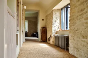 Castrads cast iron radiator in Somerset Mill conversion running a water source heat pump