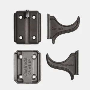 Two Atlas cast iron wall bracket sets in a dark grey finish: rectangular four-hole back plates and curved arms, shown front and back on grey.