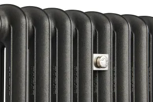 Close-up of the plain rounded columns of an Emmeline II cast iron radiator in Black Iron, with a square nickel wall stay bearing a bee motif.