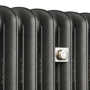 Close-up of Emmeline II cast iron radiator columns in textured Black Iron, with a square satin nickel wall stay embossed with a bee.