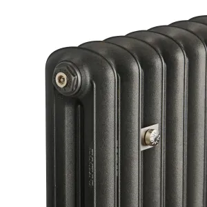 Close-up of the end of an Emmeline II cast iron radiator in Black Iron, showing rounded columns, a Castrads end plug and a nickel wall stay.