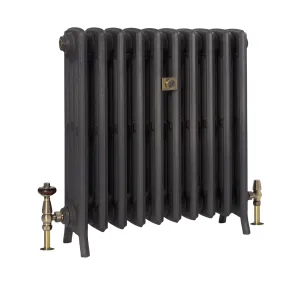 Grace 4 Column 660mm cast iron radiator on feet in a dark pewter-grey finish, with antique brass valves and a brass plaque, on white.