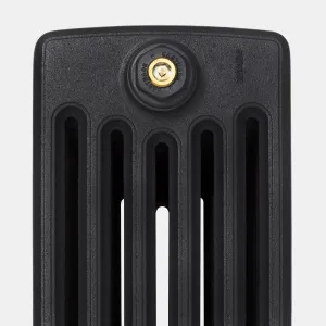 Close-up of the top of a Grace 6 Column cast iron radiator end section in Matt Black, with a brass bleed valve in a Castrads-embossed plug.