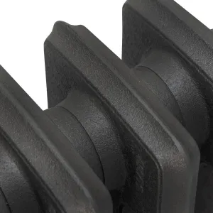 Close-up of the plain, rounded-edged sections of a Grace 4 Column cast iron radiator in a textured dark grey finish on a white background.