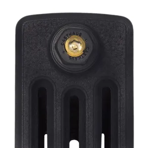 Close-up of the top of a Grace 4 Column cast iron radiator end section in black, with a Castrads-branded plug and brass bleed valve.