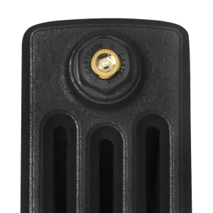 Close-up of the top end of a Grace 4 Column cast iron radiator in a black finish, with a Castrads-stamped plug and brass bleed valve.