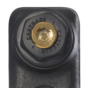 Close-up of the top of a Mercury 2 Column cast iron radiator in Matt Black, showing a hexagonal end plug stamped CASTRADS with a brass bleed screw.