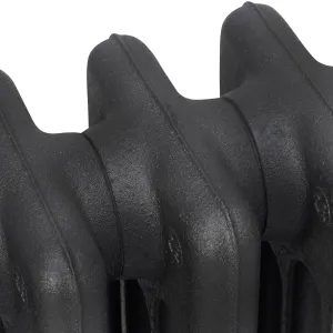 Close-up of the plain rounded sections of a Mercury cast iron radiator in Matt Black, showing the textured cast surface and joints.