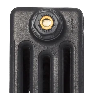 Close-up of the top of a plain Mercury 4 Column cast iron radiator in Matt Black, showing a Castrads end plug with a brass bleed screw.
