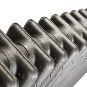 Close-up of the plain rounded column sections of a Mercury cast iron radiator in a metallic Black Iron finish, with visible cast texture.
