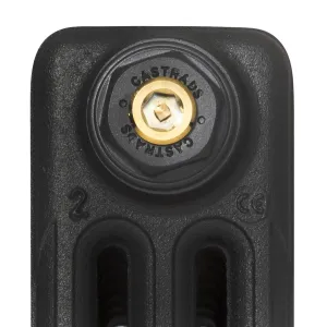 Close-up of the top of a plain Mercury cast iron radiator end section in black, with a brass bleed valve in a Castrads-stamped plug.