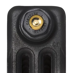 Close-up of the top of a plain Mercury cast iron radiator section in a dark pewter-grey finish, with a Castrads-stamped end plug and brass bleed valve.