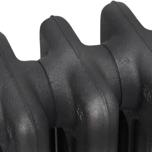 Close-up of the top of plain cast iron radiator sections with rounded columns and a textured dark grey, almost black finish.