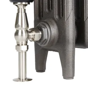 Close-up of a Mercury cast iron radiator foot in a textured dark metallic finish, fitted with a satin nickel angled valve and pipe shroud.