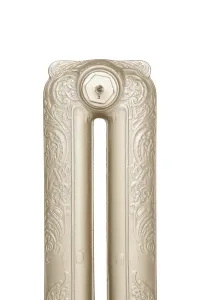 Close-up of the top of a Rococo II ornate two-column cast iron radiator section in Pearl Mouse Grey, with scrolled relief and a bleed valve plug.