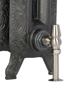 Close-up of an ornate Rococo II cast iron radiator foot in a dark iron finish, with a satin nickel angled valve and floor pipe shroud.