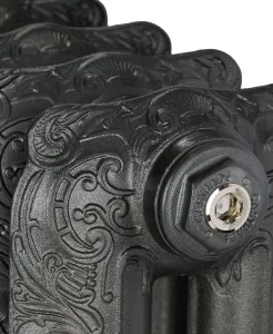 Close-up of an ornate Rococo II cast iron radiator end section in a Black Iron finish, with scrollwork and a Castrads blanking plug with a nickel bleed valve.
