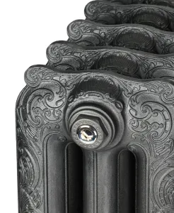 Close-up of an ornate Rococo III cast iron radiator end section in a dark iron finish, with scrollwork and a nickel bleed plug, on white.
