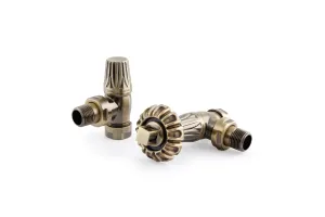 A pair of Chatsworth angled radiator valves in Antique Brass with fluted heads, one lying on its side showing the lockshield, on white.