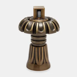 Chatsworth thermostatic radiator valve head in Antique Brass, with a fluted mushroom cap, ringed neck and square spindle top, on a grey background.