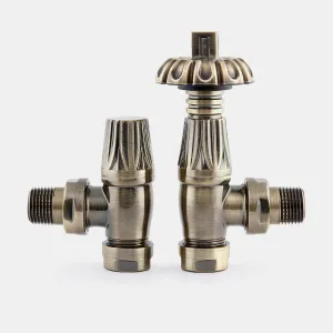Pair of Chatsworth angled radiator valves in Antique Brass, a thermostatic head with ornate fluted crown beside a lockshield, on a plain grey background.