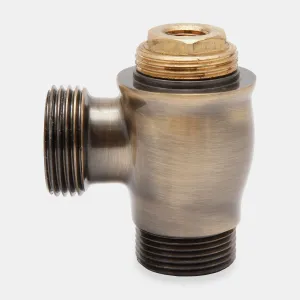 Chatsworth angled radiator valve body in a brushed Antique Brass finish, with threaded inlet and outlet and a bare brass top fitting, on a grey background.