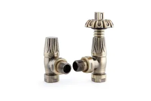 Pair of Chatsworth angled radiator valves in Antique Brass, a thermostatic valve with ornate fluted head and a matching lockshield, on white.