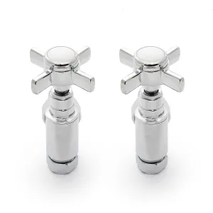 A pair of Crosshead radiator valves in polished chrome with four-spoke cross handles, shown upright on a white background.
