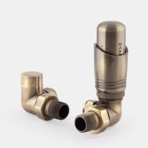 Niva corner thermostatic radiator valve and matching lockshield in a brushed Antique Brass finish, shown on a plain light grey background.