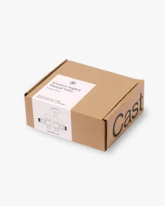 Kraft cardboard box for the Windsor Angled Manual Valve in Antique Brass, with a white label showing a valve line drawing and 'Cast' on the side.