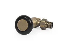 Windsor angled manual radiator valve in Natural Brass with a black round head and brass cap, threaded tail and hex nut, on a white background.