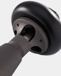 Close-up of a Windsor angled TRV in Natural Pewter, showing the textured valve body, threaded collar and black thermostatic head.