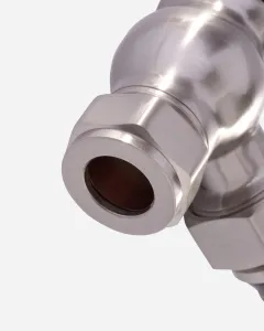 Close-up of a Windsor angled radiator valve in Satin Nickel, showing the hexagonal compression nut and pipe inlet on a pale grey background.