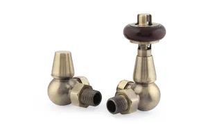 Pair of Windsor corner radiator valves in Antique Brass, a thermostatic valve with dark wooden head beside a lockshield, on white.