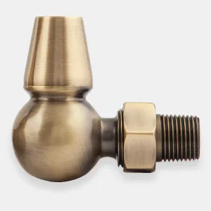 Windsor corner radiator valve in Natural Brass, with a ball-shaped body, tapered cap, hexagonal nut and threaded tail, on a pale grey background.