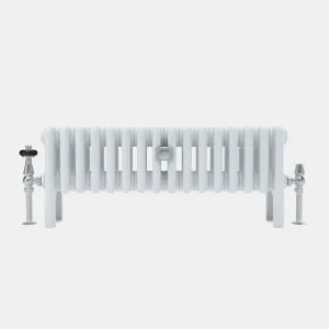 Low white Florence 4 column steel radiator on feet, front view, with chrome angled thermostatic valve and lockshield on floor pipes.