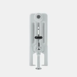 End view of a white Florence 4 column steel radiator on feet, with a chrome angled valve with black head and a vertical floor pipe.