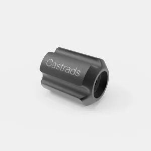 A black fluted cylindrical socket piece from the ATK2 tool kit, engraved with the Castrads logo, on a plain pale grey background.